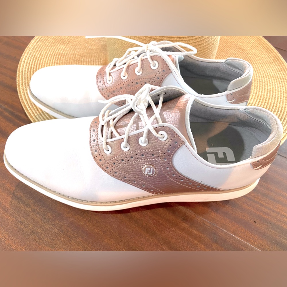 Foot joy life’s golf shoes.  Size 10 rose gold.  Never worn